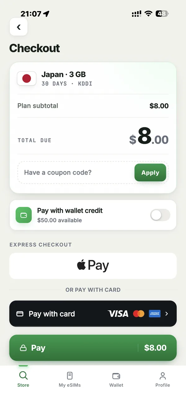 The in-app checkout: order total, a coupon code field, a wallet credit toggle, Apple Pay and pay with card.
